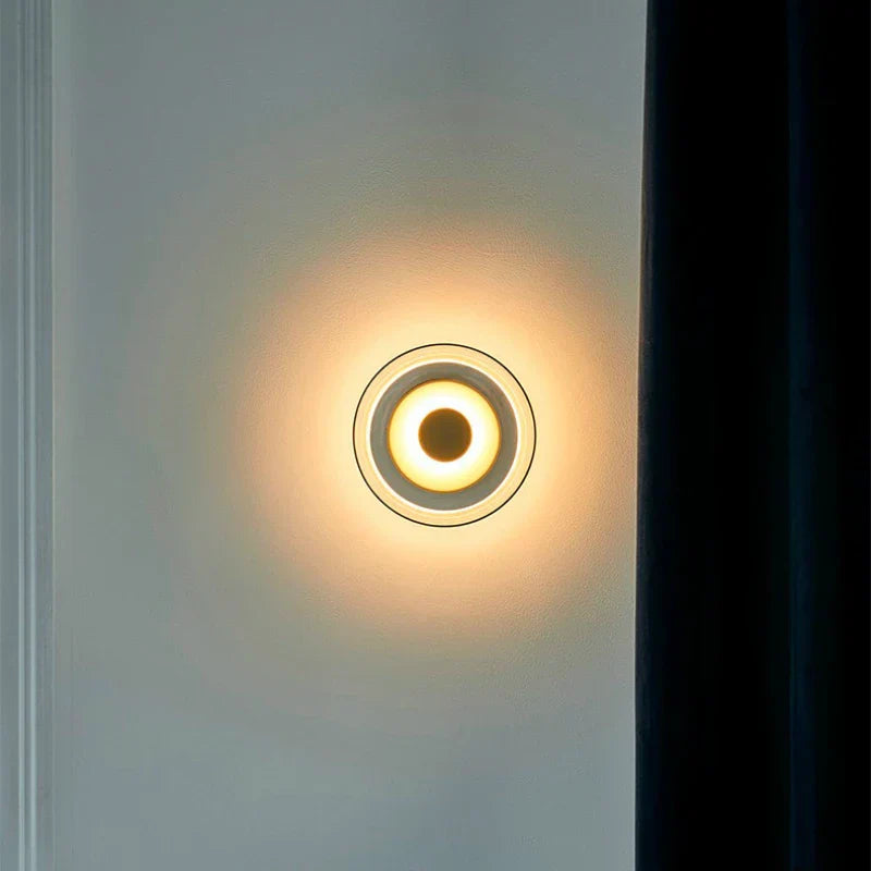 Suspended wall lamp with glass bowl