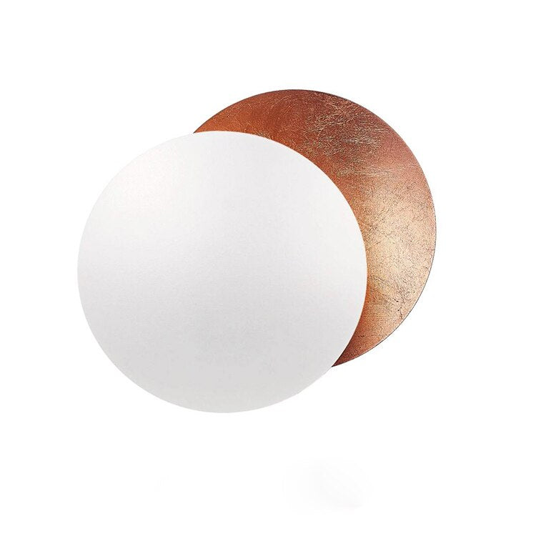 Wall lamp with solar eclipse design