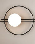 Wall lamp for the bedroom made of metal and glass