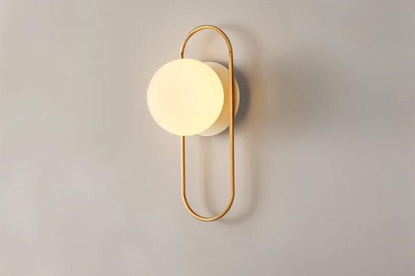 Wall lamp for the bedroom made of metal and glass