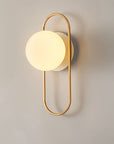 Wall lamp for the bedroom made of metal and glass