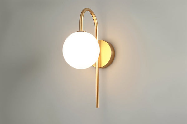 Wall lamp for the bedroom made of metal and glass