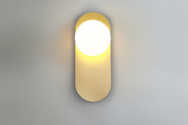 Wall lamp for the bedroom made of metal and glass