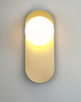 Wall lamp for the bedroom made of metal and glass