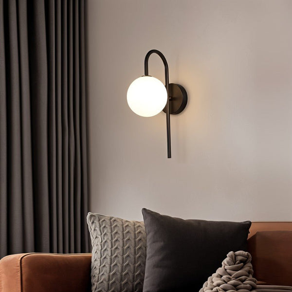 Wall lamp for the bedroom made of metal and glass