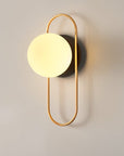 Wall lamp for the bedroom made of metal and glass