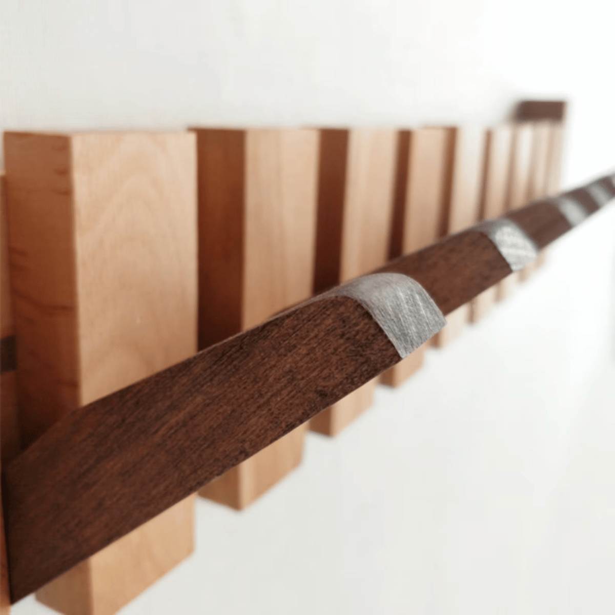 Wooden piano coat rack